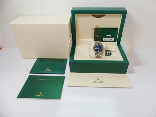 2023 Rolex men's SS Datejust 126200 36mm, blue sticks Oyster band b/p
