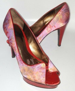 carlos santana red heels