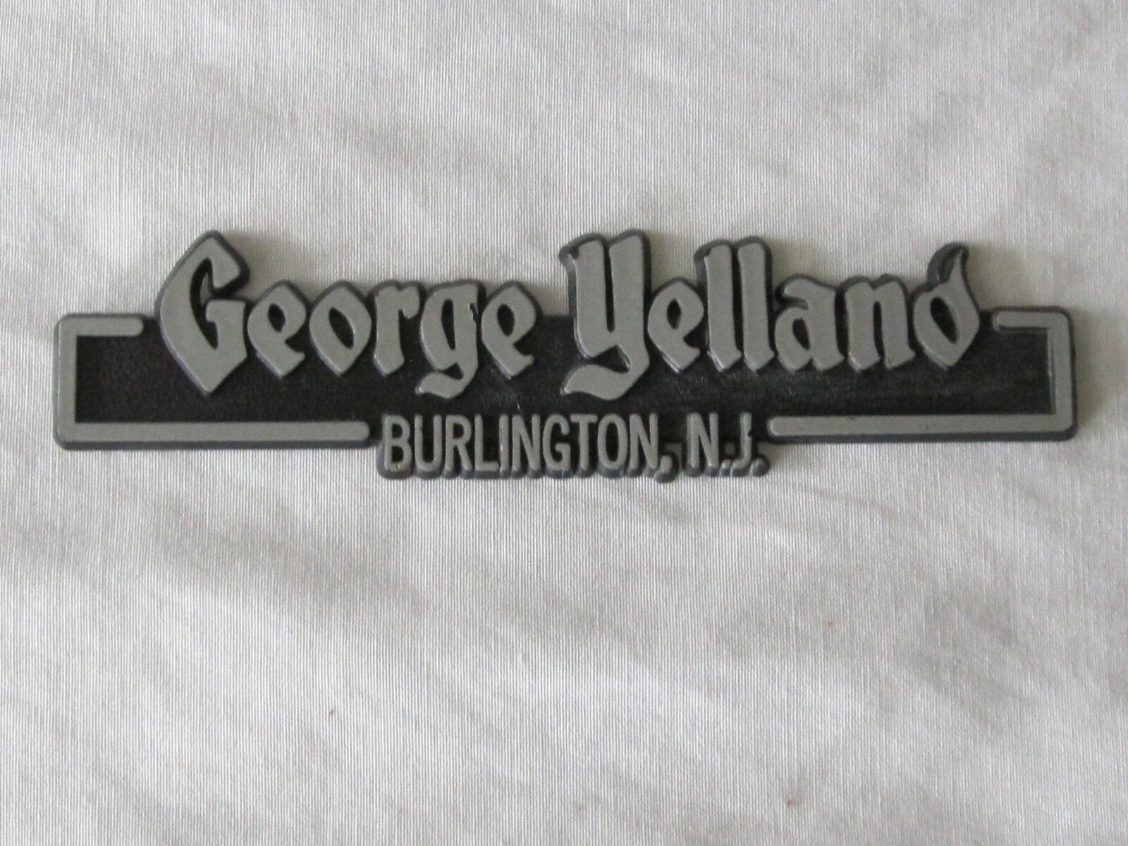 Vintage Yelland Car Dealer Emblem Burlington NJ Plastic Gray