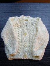 New lemon DK V neck cardigan to fit a new baby