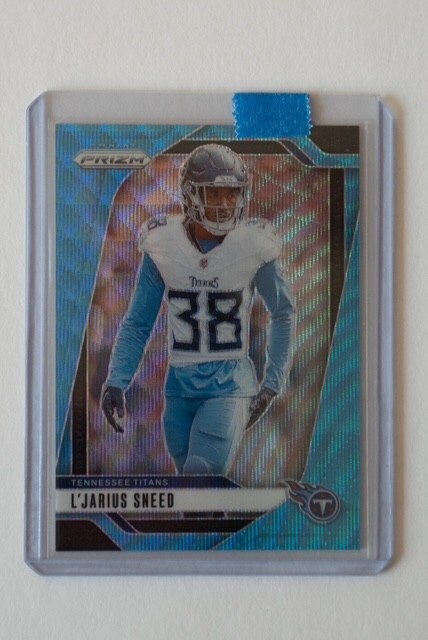 2024 Panini Prizm - Blue Wave Prizm #283 L'Jarius Sneed /230