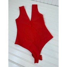NWT Free People Keep It Sleek Bodysuit Size XS -Pink Pointsetta Scoop Back Shell