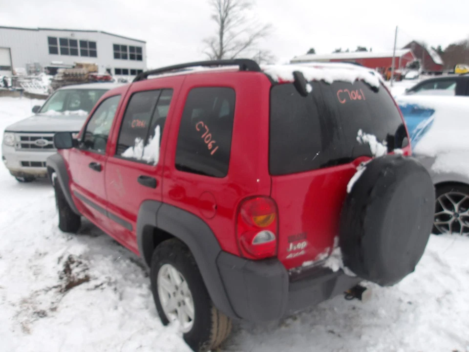 Espejo retrovisor interior usado se adapta a: 2004 Jeep Liberty Grado A Foto 3 de 4