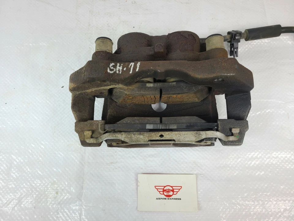 Pinza de freno delantera izquierda Jeep Grand Cherokee 2014-2015 OEM Foto 3 de 4