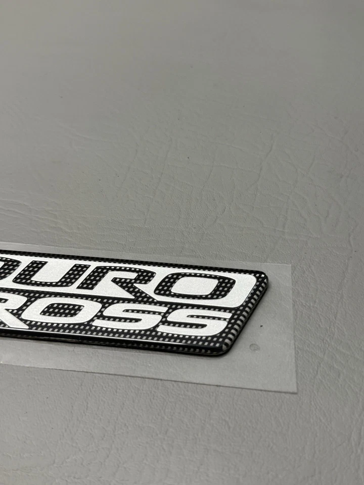 Mitsubishi Raider Duro 2006-2009 emblema de puerta lateral cruzada logotipo insignia usado fabricante original Foto 4 de 4