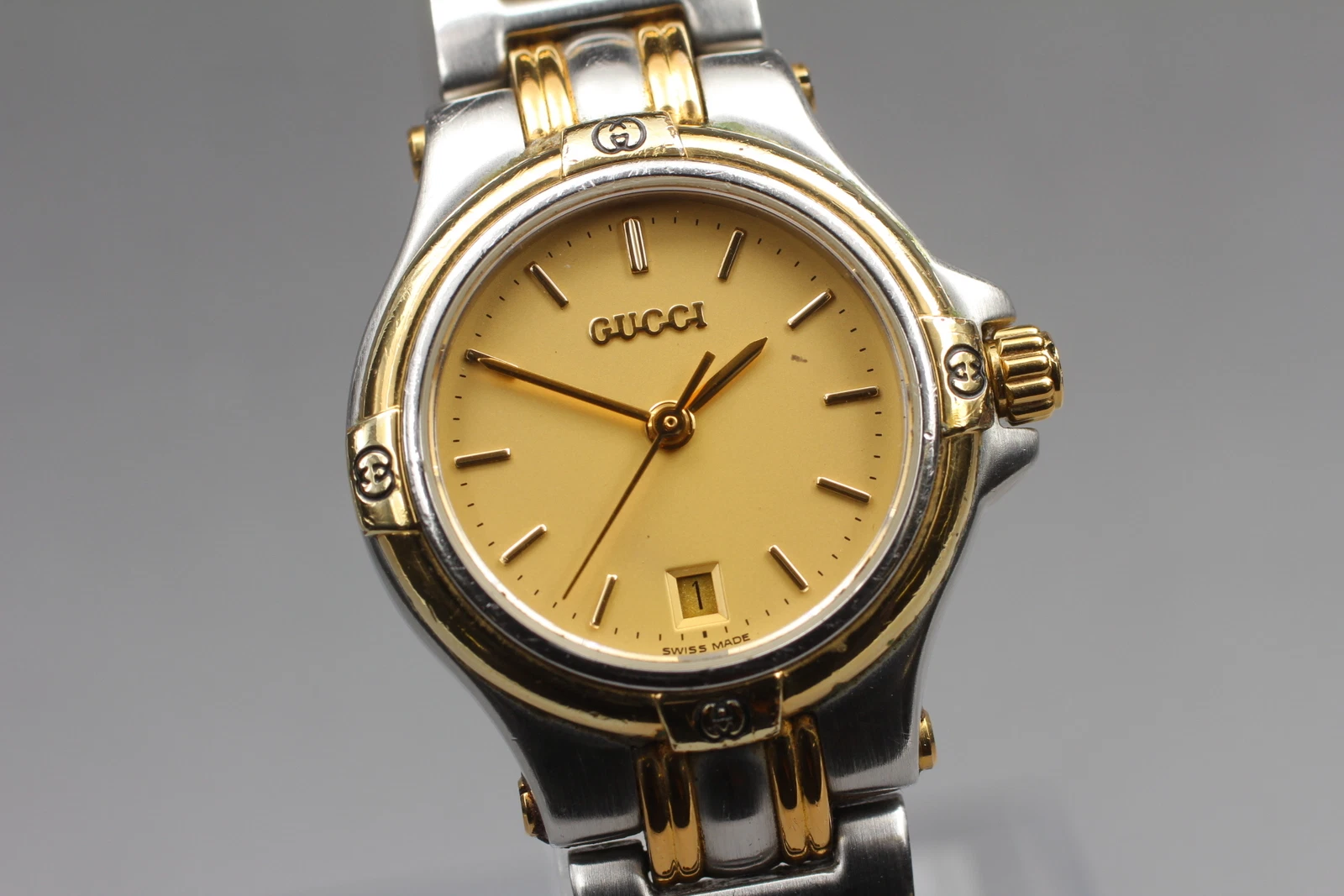 Montre femme vintage GUCCI 9040L cadran doré bicolore Qz Swiss Made from Japan