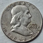 1958 Franklin silver half dollar.