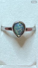  78B- .45ct Genuine Ethiopian Welo Opal set in a 925 Sterling Silver Size 7 Ring
