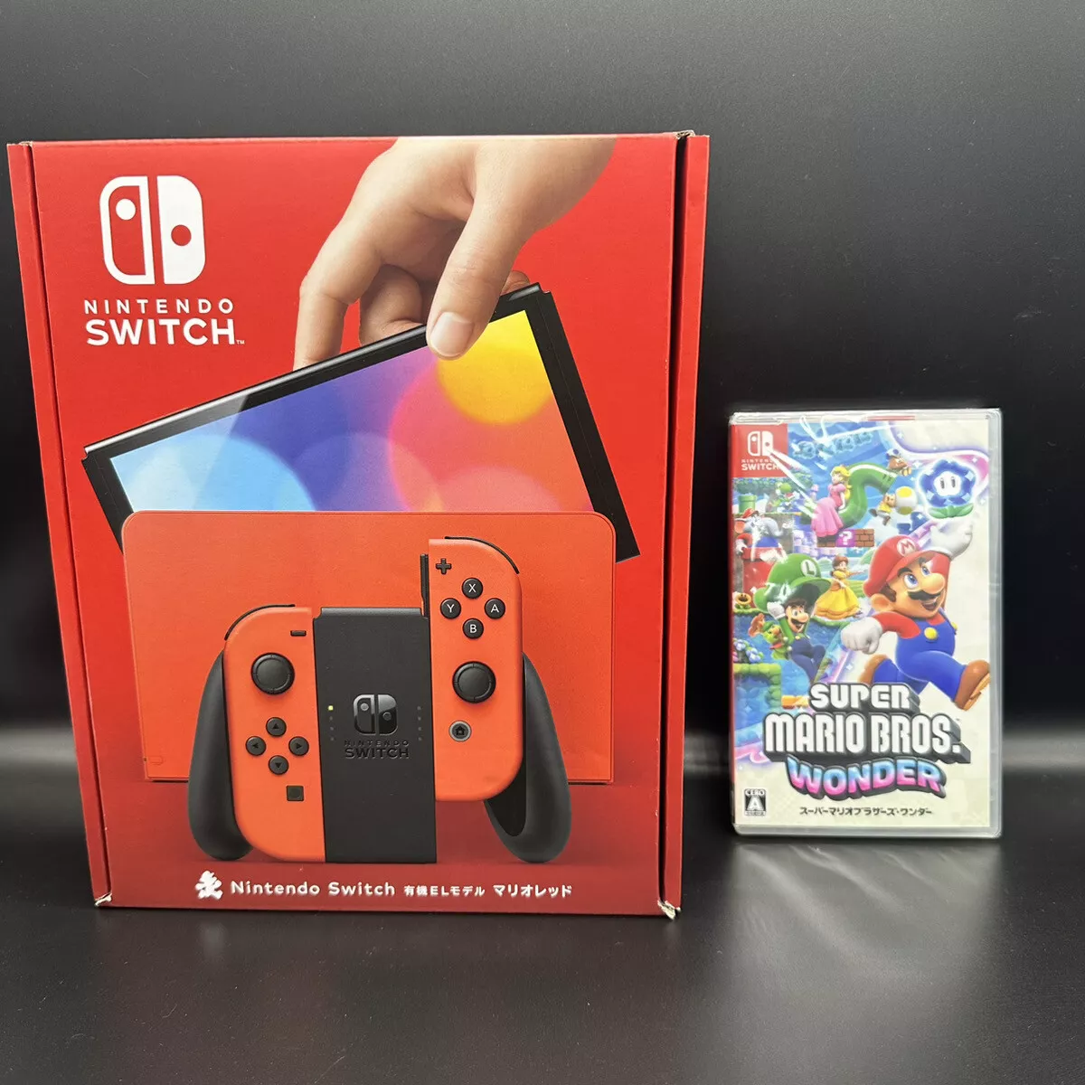 Nintendo Switch OLED Mario Red Edition Console + Super Mario Bros Wonder NEW