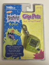 NEW Giga Pets Reptar Rugrats 1998 Tiger Electronics Virtual Tamagotchi Nano