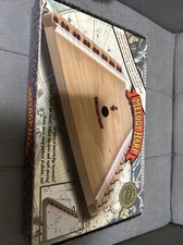 MELODY HARP BY TROPHY MUSIC CO. W/ 6 MUSIC SHEETS