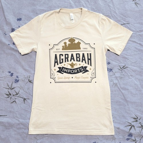 Disney Aladdin Agrabah Imports Magic Lamp Genie T-Shirt Men Unisex Off-White