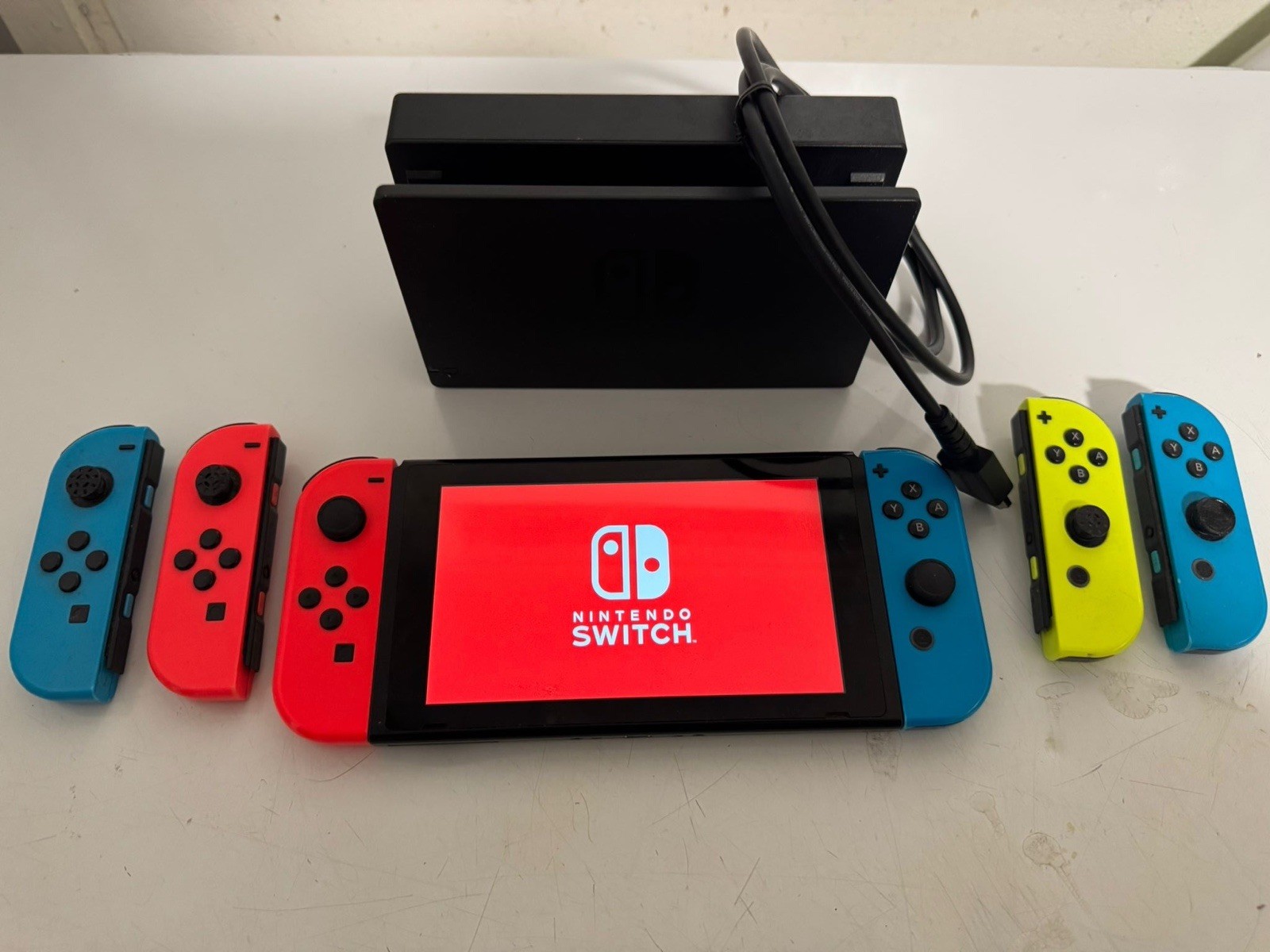Nintendo Switch Console,  and Controllers and 5 games