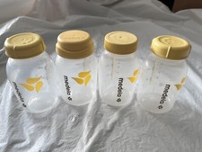 MEDELA 5OZ PLASTIC BOTTLES WITH CAPS, PREOWNED, EUC, LOT OF 4