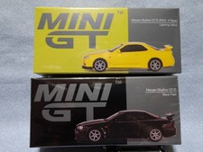 new MINI GT Nissan Skyline GT-R 762 R-34 V Spec Lightning Yellow & 570 Black