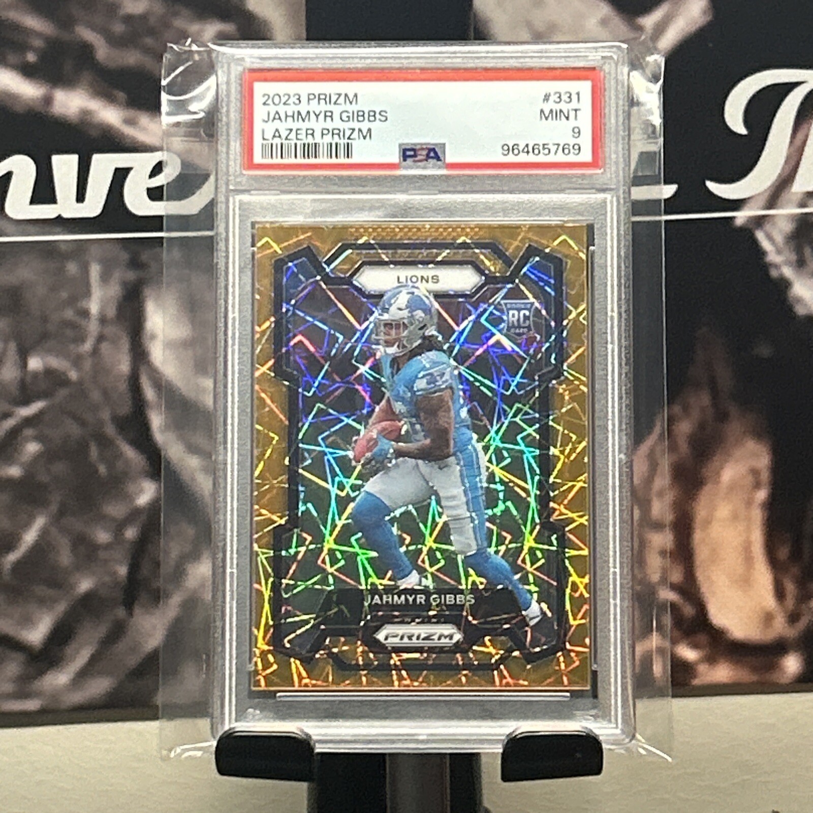 2023 Panini Prizm Jahmyr Gibbs Orange Lazer Prizm Rookie RC #331 PSA 9 Lions