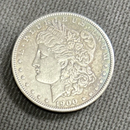 1900 Silver Morgan Dollar TONING AU NICE!