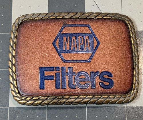 Vintage 1980s NAPA Filters Advertising Belt Buckle Auto Parts Rope Border