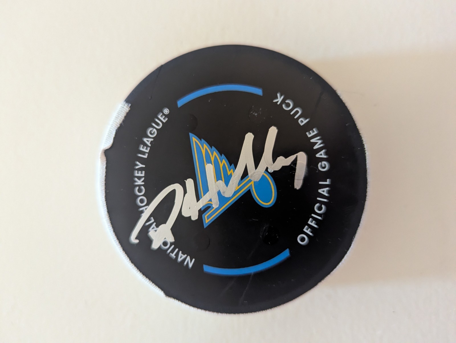 Dylan Holloway goal scored and autographed Puck.