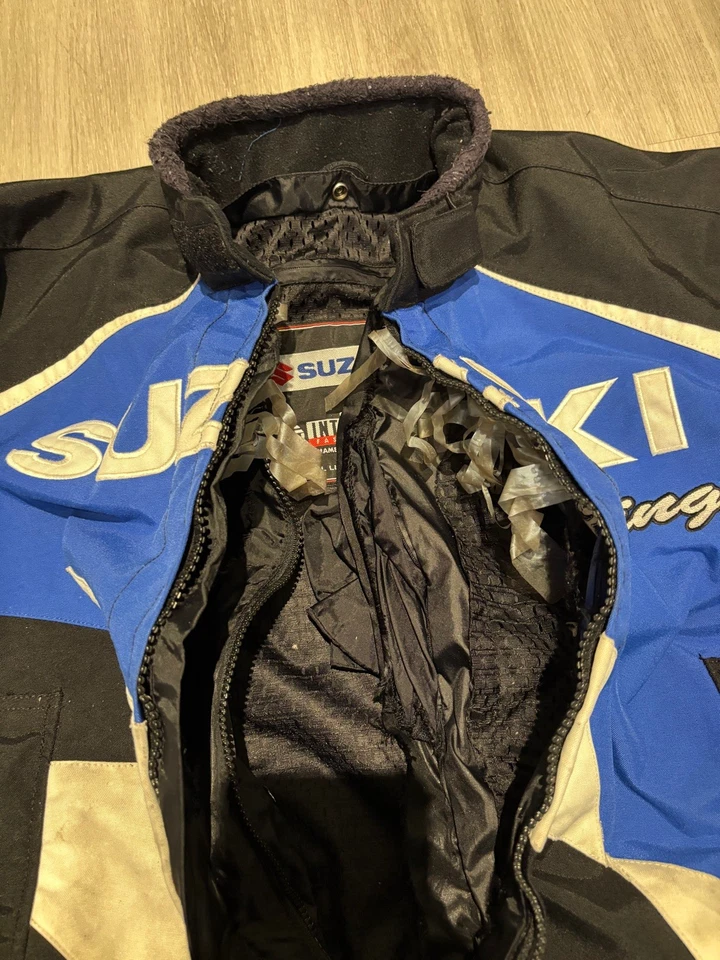 Chaqueta de carreras Suzuki negra y azul para hombre talla L Foto 2 de 4