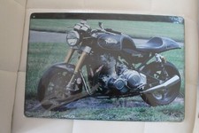 plaque publicitaire moto