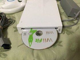 Wii nintendo console & accessories, remote, wheels, nunchuck, power cord,, works