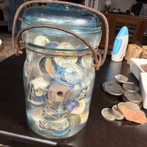 Atlas Blue Mason Canning Jar, Quart, Filled With Bobbins Of Thread