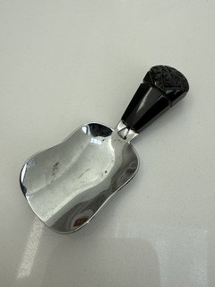 ANTIQUE TEA CADDY SPOON WITH CARVED BLACK HANDLE