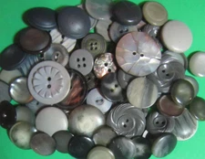 (65)  ASSORTED 5/8"-1&1/4" GRAY PLASTIC SHANK 2&4-HOLE CRAFT BUTTONS-Y43