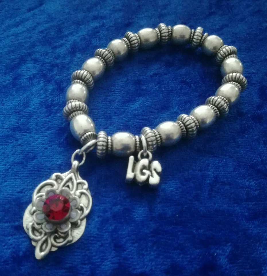 Bijou BRACELET LGS LES GENS DU SUD métal argenté breloque pierre rouge - Photo 2/4