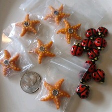 W Fifteen Piece Glass Lampwork Beads, 10 Pc Ladybug and Five Pc Starfish