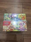 Pokémon : Display Mini Tins EV8.5 Evolution Prismatique Neuf Scellé FR