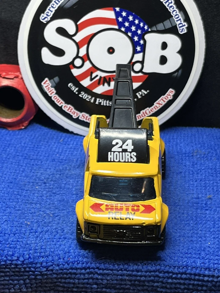 Camión de remolque Matchbox 1985 furgoneta avería 4x4 1:64 amarillo fundido a presión usado casi nuevo Foto 3 de 4