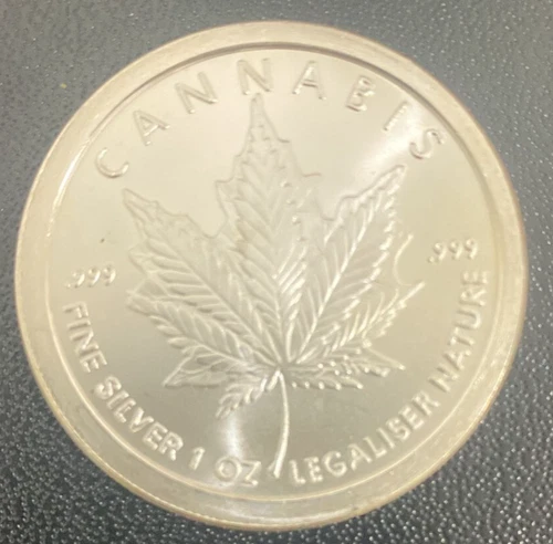 2013 1 oz Silver Cannabis - Silver Bullet Silver Shield BU  Round in capsule