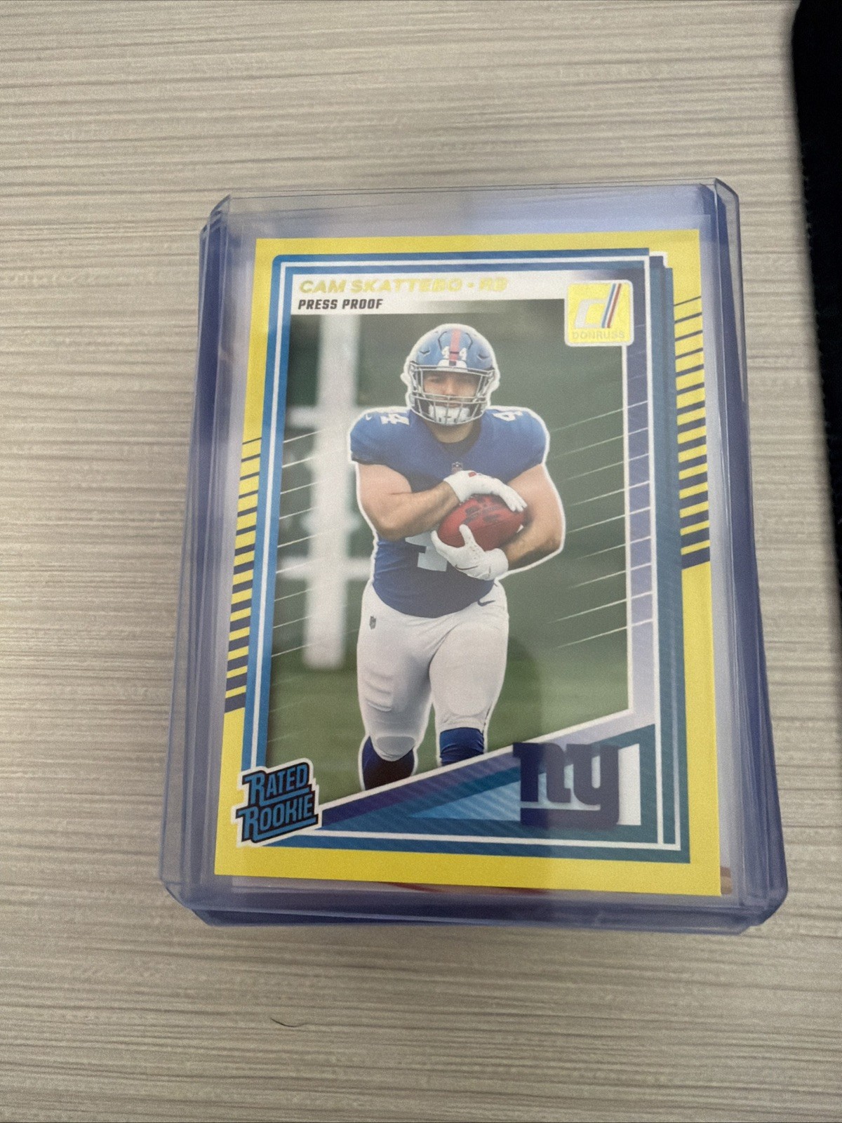 2025 Panini Donruss - Rated Rookie Cam Skattebo #302 Press Proof Yellow (RC)