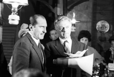 Italian director Dino Risi holding a microphone beside Italian act- Old Photo