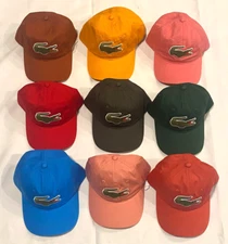 NEW WITH TAGS LACOSTE HATS & CAPS 100% COTTON ADJUSTABLE STRAP ONE SIZE FIT ALL.