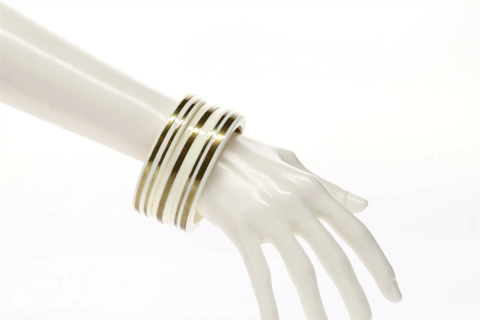 Brazalete de plástico triple oro crema TORY BURCH 133923 Foto 2 de 2