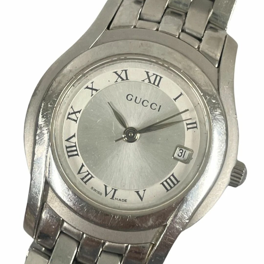 Montre à quartz femme Gucci 5500L date cadran argenté