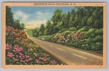 Greetings from Chatham NY Postcard 1952 Vintage Scenic Road with Flowers