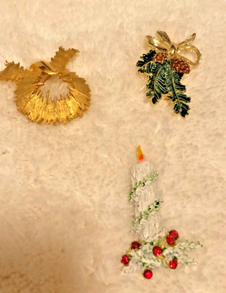 broches vintage en métal argenté représentant des ani