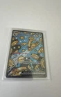Gholdengo ex 164/131 Sv: Prismatic Evolutions Holo