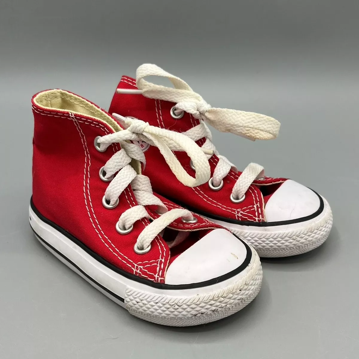 Baby red hotsell chuck taylors