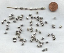 50 VINTAGE ANTIQUE SILVER PLATED 5mm. CARVED OVAL SPACER BEADS   4355