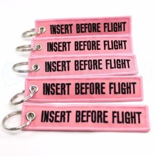 INSERT BEFORE FLIGHT QTY 5 PCS PINK/black KEYCHAINS RING TAGS CABIN CREW