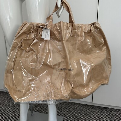 COMME DES GARCONS PAPER BAG WITH PRICE TAG £345 17 X 15 INCHES