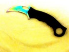Mtech Rainbow Karambit features an aluminum handle with G-10 inserts  — photo 3