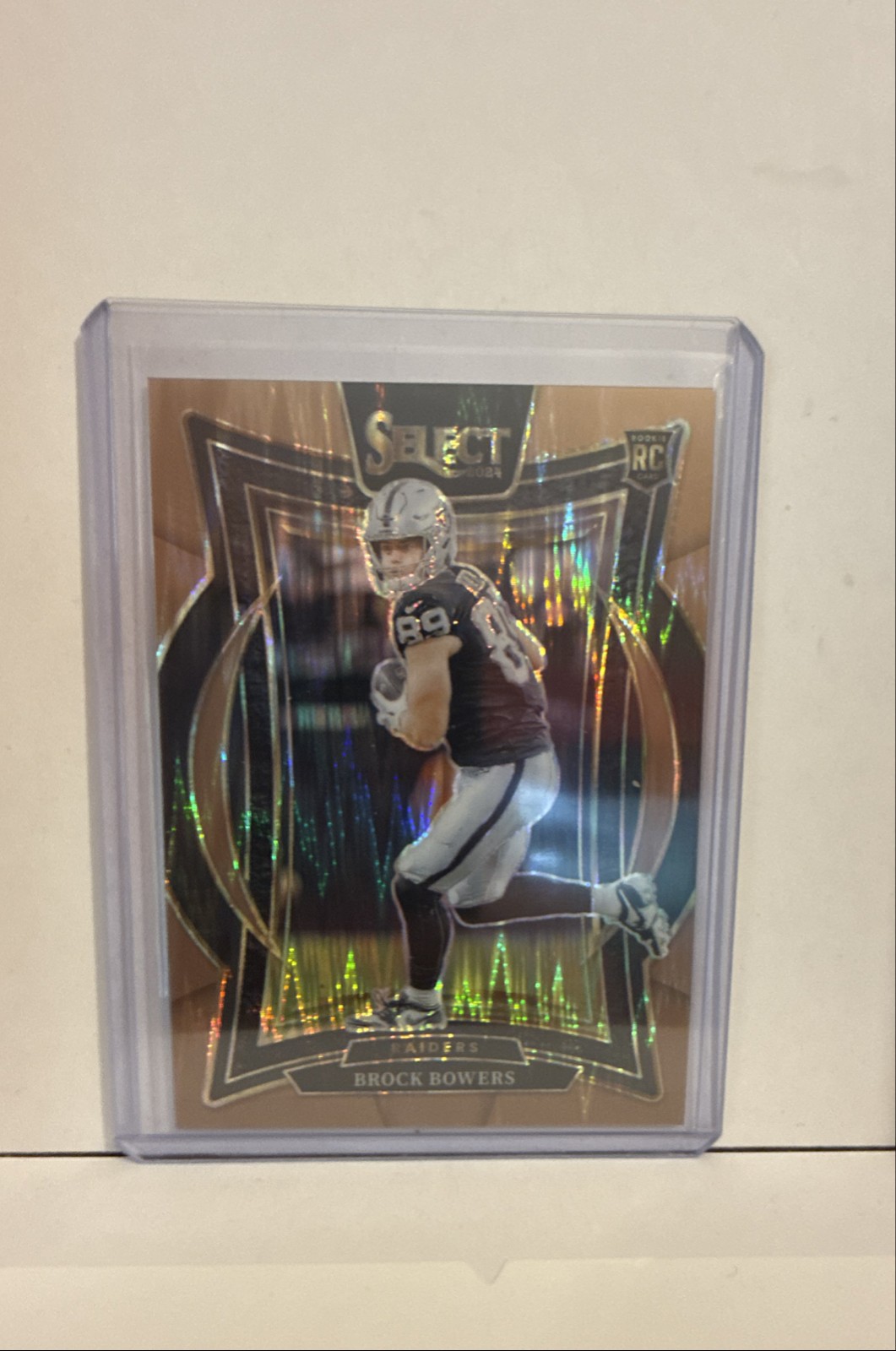 2024 Panini Select - Concourse Brock Bowers #31 Copper Shock Prizm /299 (RC)