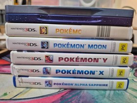 Nintendo 3DS Pokemon Game Bundle (X, Y, Alpha Sapphire, Sun, Moon & Steelcase)
