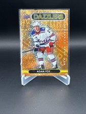 2021-22 Upper Deck Series 2 - Dazzlers Adam Fox #DZ-81 Orange